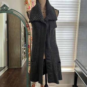 Long knit best. Barely worn.